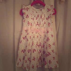 Chiffon tea dress with pleating & pink bow.